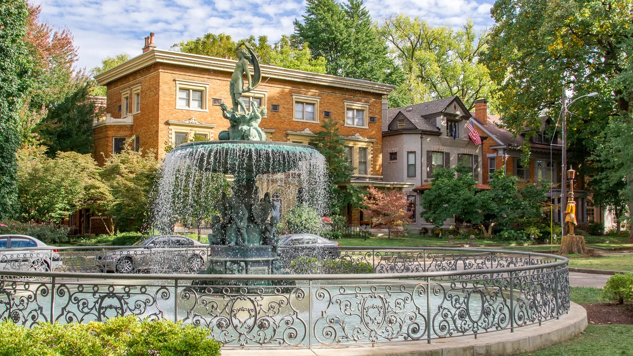 Fountain at St. James Court among historic brick homes in Old Louisville